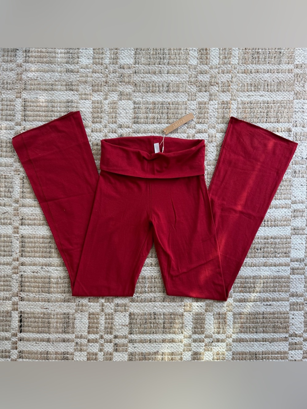 SKIMS Fold-Over Waist Yoga Pants in Burgundy Red